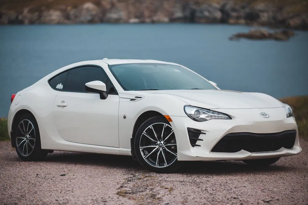 white sports car toyota with affordable auto insurance in Freeland, MI